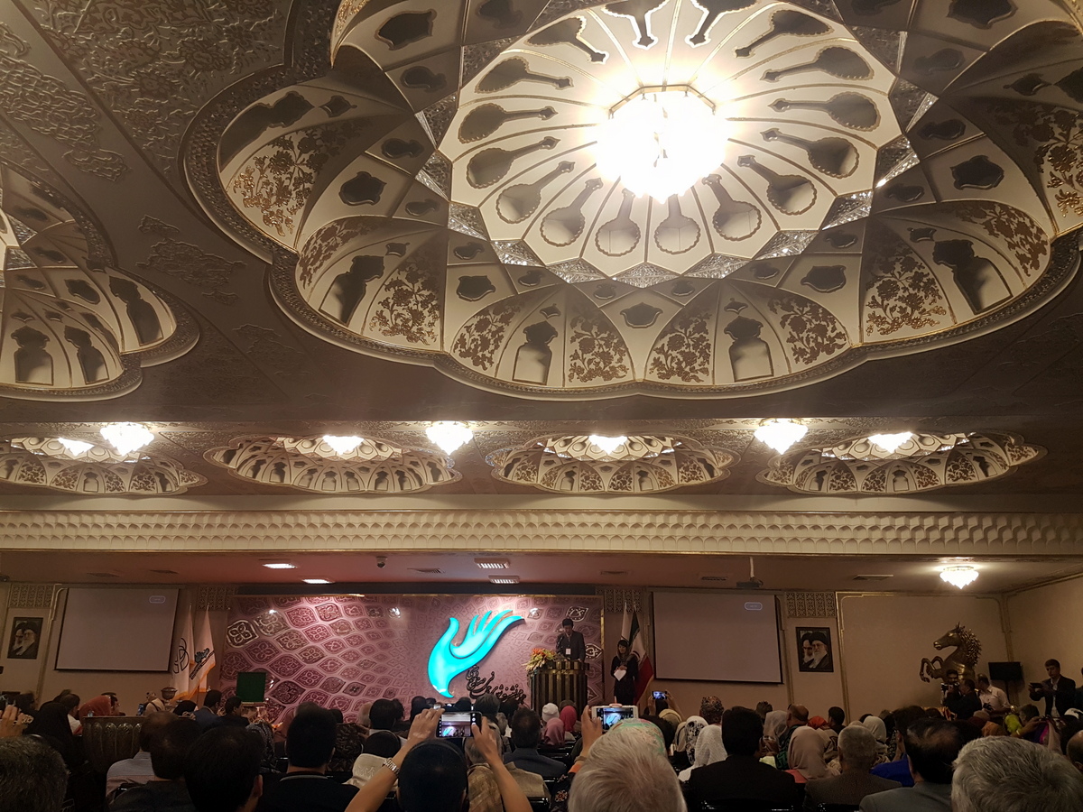 Departing President from China, Mr Wang Shen, addresses the General Assembly under the dazzling ceiling of the Abbasi Hotel.